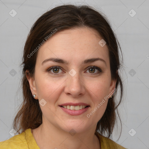 Joyful white young-adult female with medium  brown hair and brown eyes