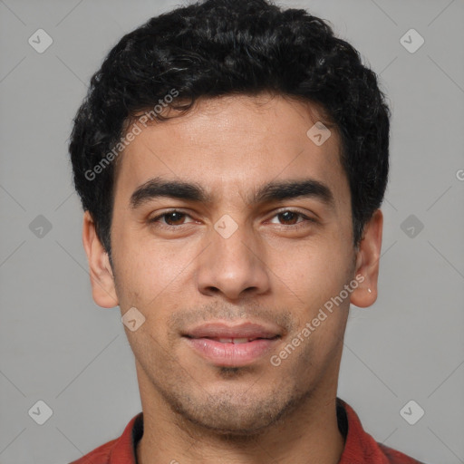 Joyful white young-adult male with short  black hair and brown eyes