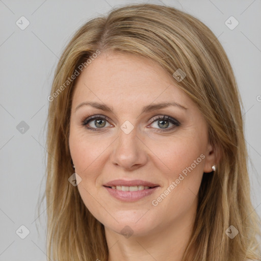 Joyful white young-adult female with long  brown hair and green eyes