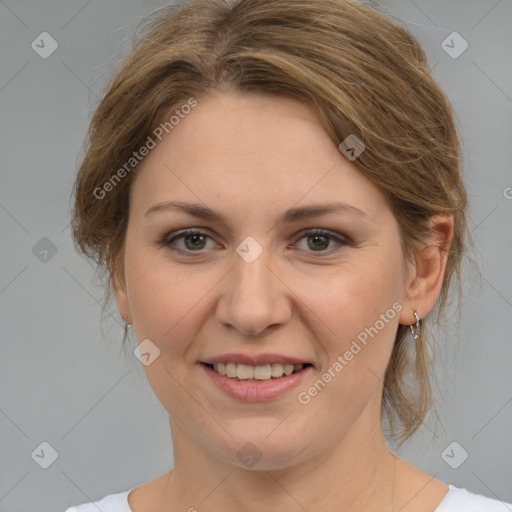 Joyful white young-adult female with medium  brown hair and grey eyes