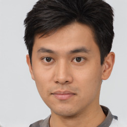 Neutral asian young-adult male with short  brown hair and brown eyes