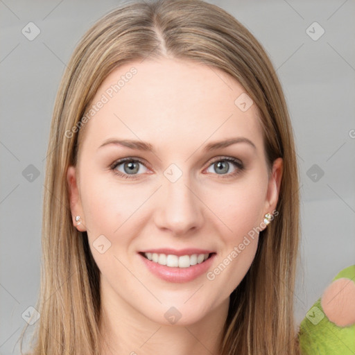 Joyful white young-adult female with long  brown hair and green eyes