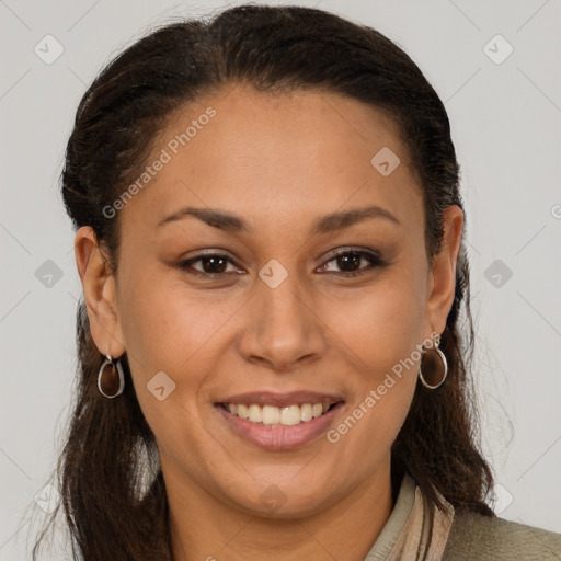 Joyful latino young-adult female with long  brown hair and brown eyes