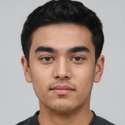 Neutral latino young-adult male with short  black hair and brown eyes
