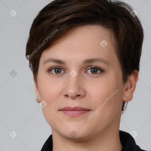 Joyful white young-adult female with short  brown hair and brown eyes