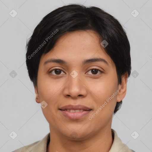 Joyful latino young-adult female with short  black hair and brown eyes