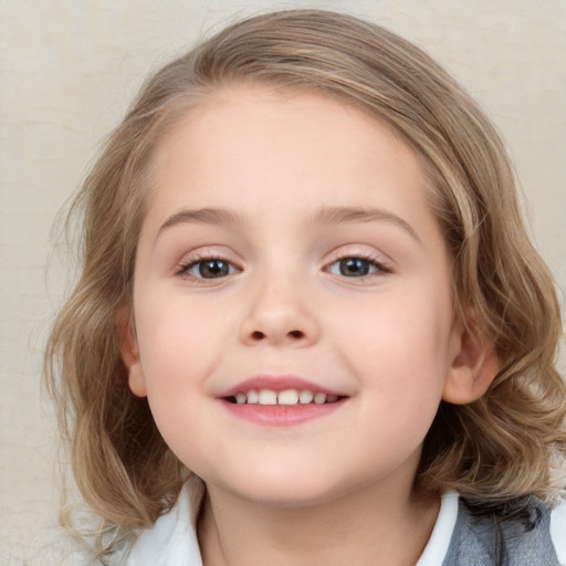 Joyful white child female with medium  brown hair and blue eyes