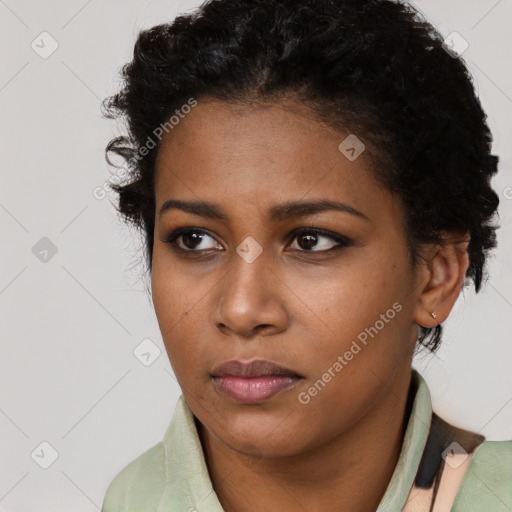 Neutral black young-adult female with short  brown hair and brown eyes