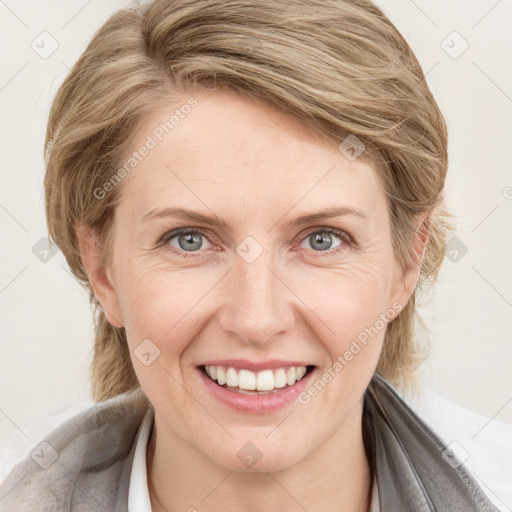 Joyful white young-adult female with medium  brown hair and blue eyes