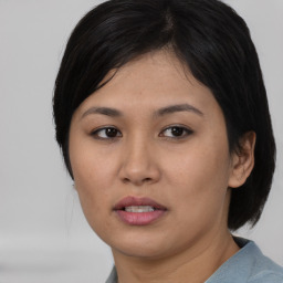 Neutral asian young-adult female with medium  black hair and brown eyes