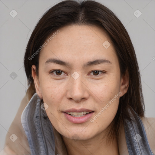 Joyful asian young-adult female with medium  brown hair and brown eyes