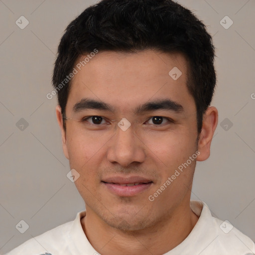 Joyful white young-adult male with short  black hair and brown eyes