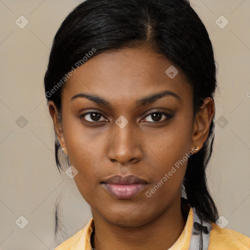 Neutral black young-adult female with medium  black hair and brown eyes