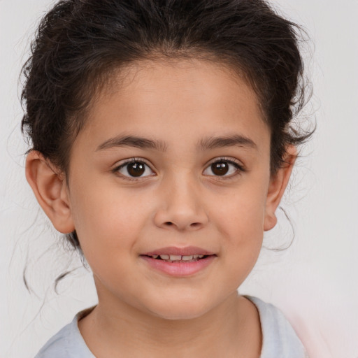 Joyful white child female with medium  brown hair and brown eyes