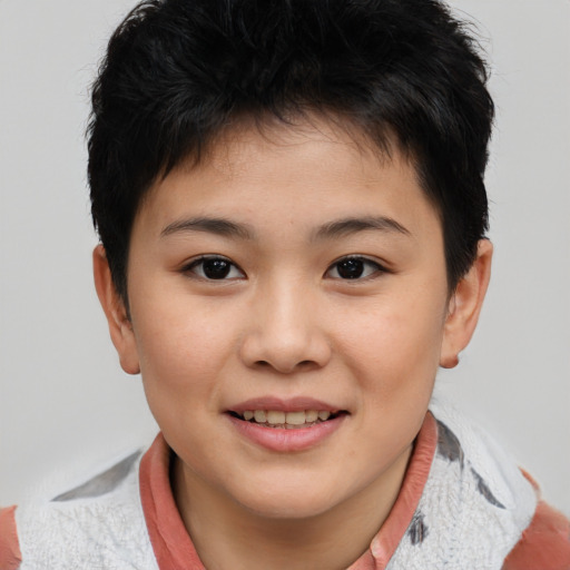 Joyful asian child female with short  brown hair and brown eyes