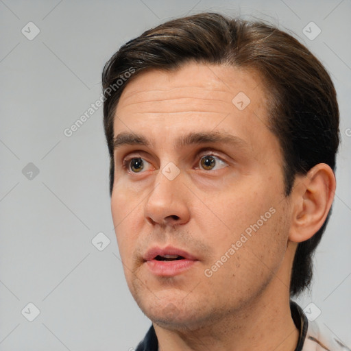 Neutral white adult male with short  brown hair and brown eyes