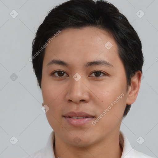 Joyful asian young-adult female with short  brown hair and brown eyes