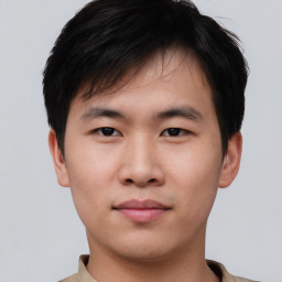 Neutral asian young-adult male with short  brown hair and brown eyes