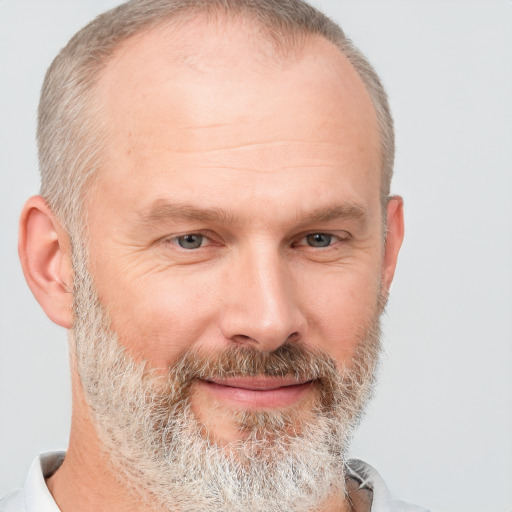 Joyful white middle-aged male with short  brown hair and grey eyes