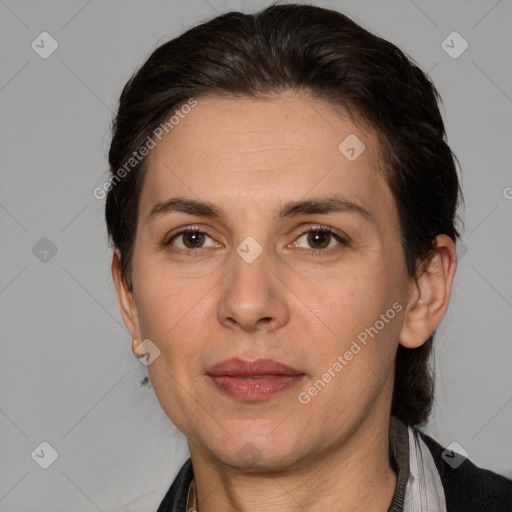 Joyful white adult female with medium  brown hair and brown eyes