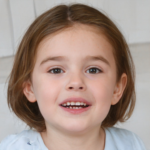 Joyful white child female with medium  brown hair and blue eyes