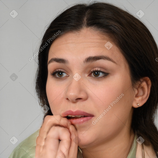 Neutral white young-adult female with medium  brown hair and brown eyes