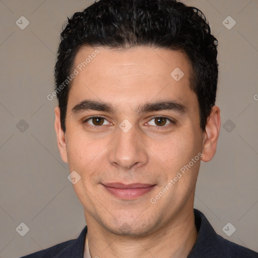 Joyful white young-adult male with short  black hair and brown eyes