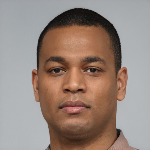 Neutral black young-adult male with short  black hair and brown eyes