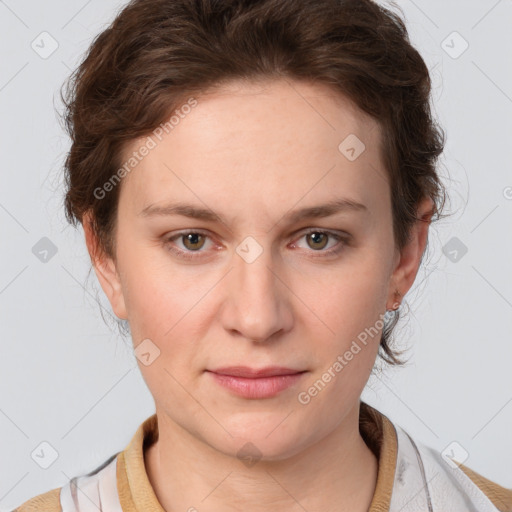 Joyful white young-adult female with medium  brown hair and blue eyes