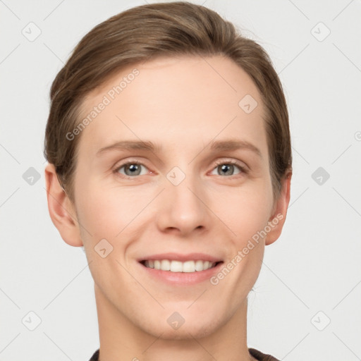 Joyful white young-adult female with short  brown hair and grey eyes