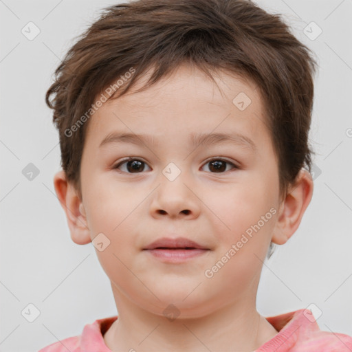 Joyful white child male with short  brown hair and brown eyes