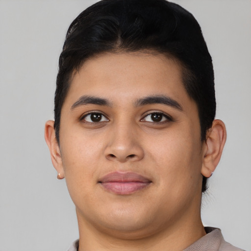 Joyful asian young-adult male with short  black hair and brown eyes