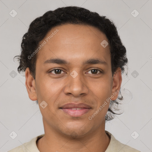 Joyful latino young-adult male with short  brown hair and brown eyes