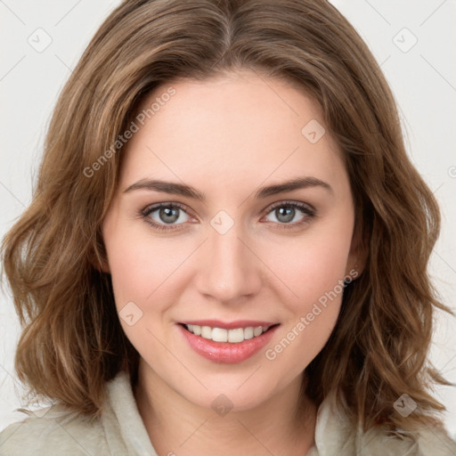 Joyful white young-adult female with medium  brown hair and green eyes