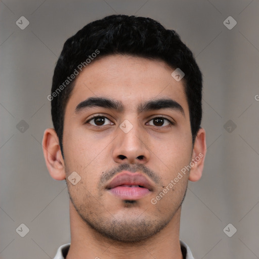 Neutral latino young-adult male with short  black hair and brown eyes