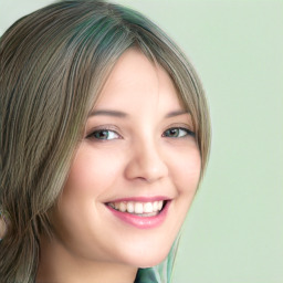 Joyful white young-adult female with long  brown hair and green eyes