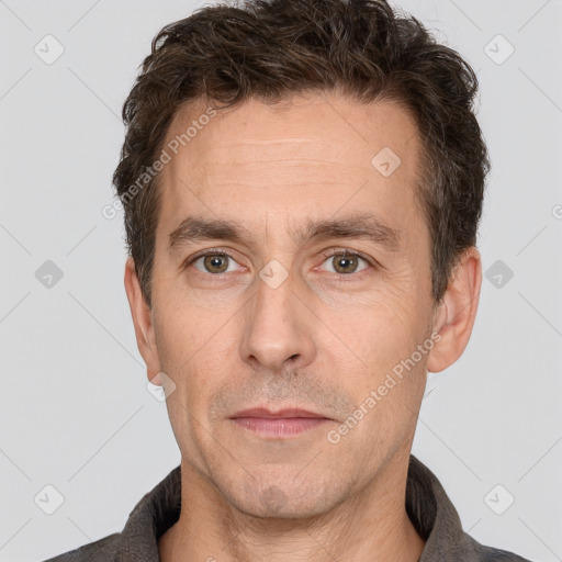 Neutral white adult male with short  brown hair and brown eyes