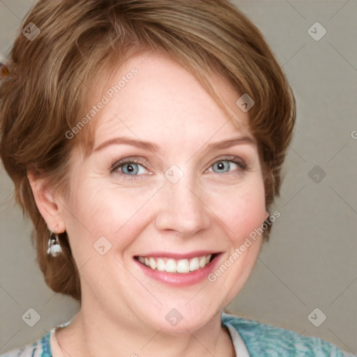 Joyful white adult female with medium  brown hair and blue eyes