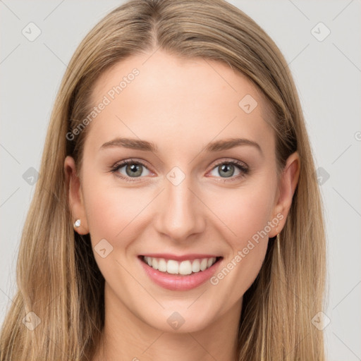 Joyful white young-adult female with long  brown hair and grey eyes