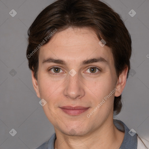 Joyful white adult female with short  brown hair and grey eyes