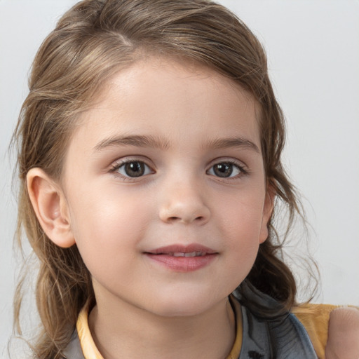 Joyful white child female with medium  brown hair and brown eyes