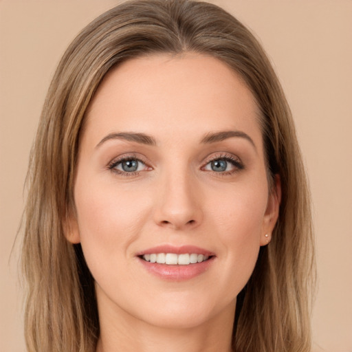 Joyful white young-adult female with long  brown hair and grey eyes