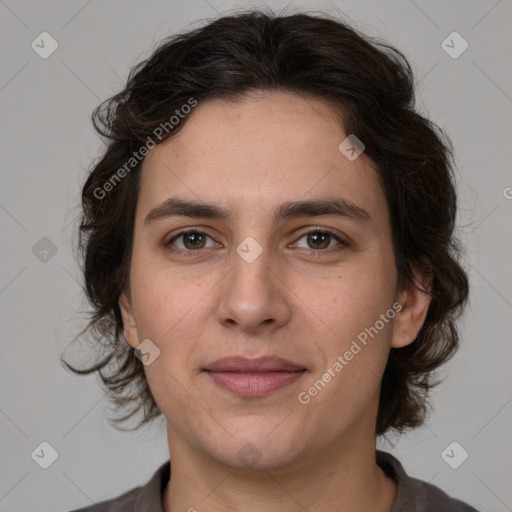 Joyful white adult female with medium  brown hair and brown eyes