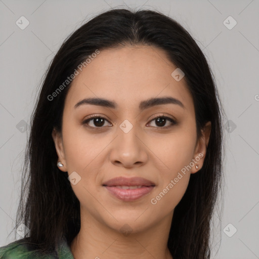 Joyful latino young-adult female with long  brown hair and brown eyes