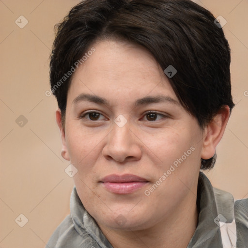 Joyful white adult female with medium  brown hair and brown eyes