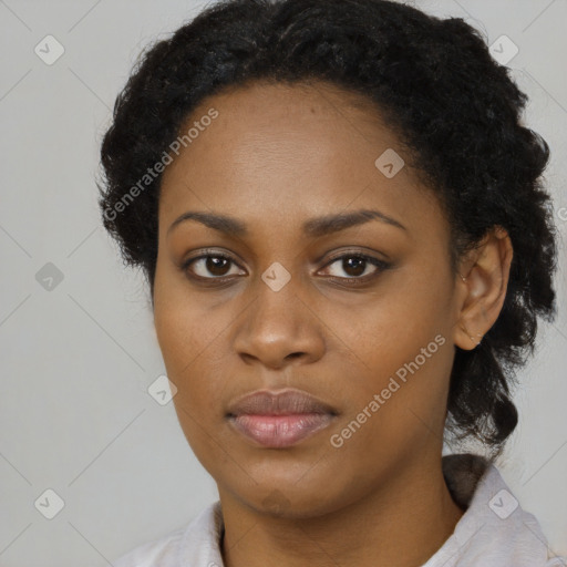 Neutral black young-adult female with medium  black hair and brown eyes