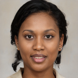 Joyful black young-adult female with medium  black hair and brown eyes
