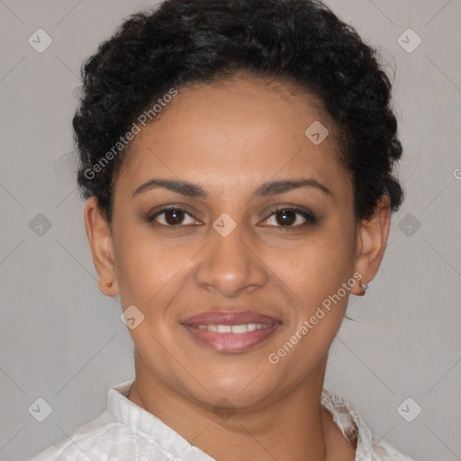 Joyful latino young-adult female with short  brown hair and brown eyes