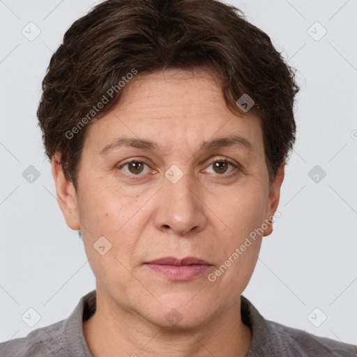 Joyful white adult female with short  brown hair and brown eyes