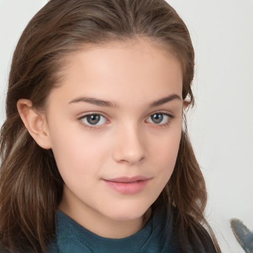 Joyful white child female with long  brown hair and brown eyes